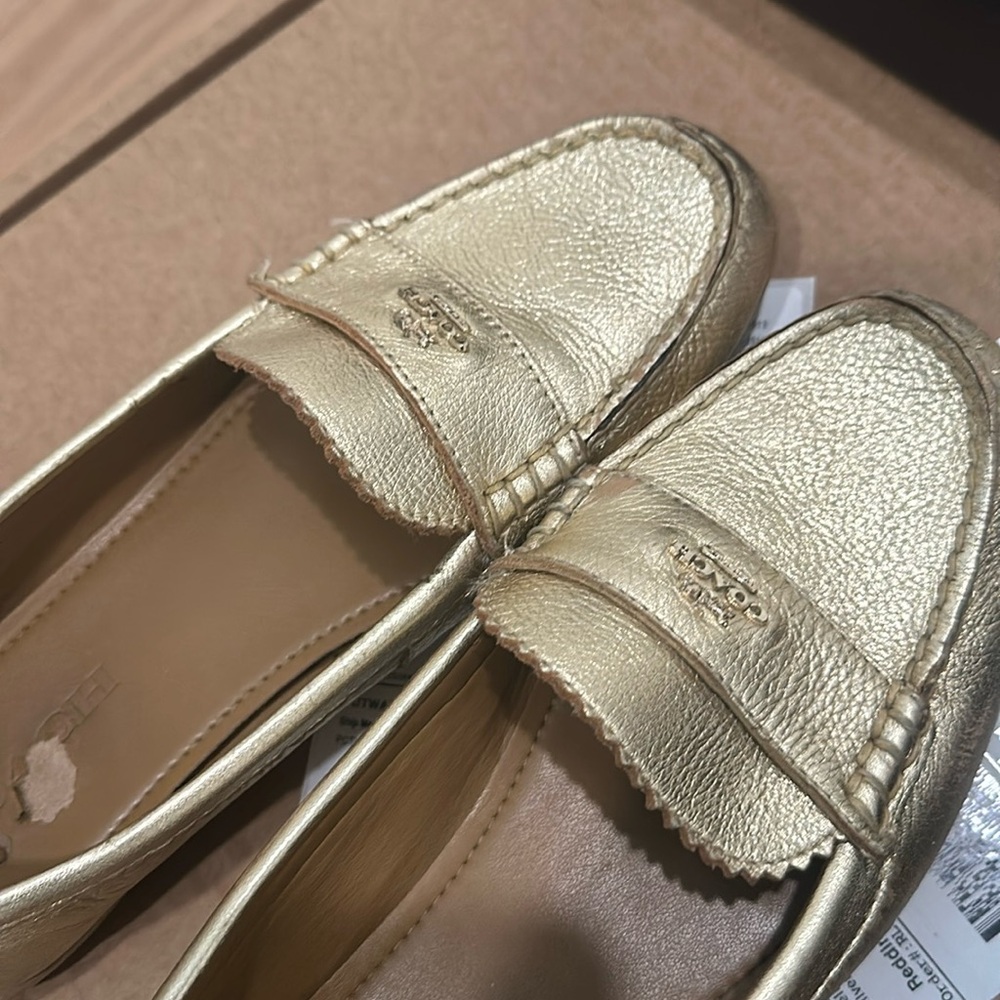 Gold coach loafers